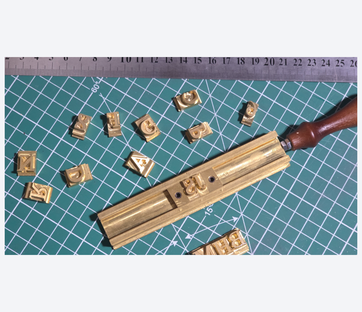 Close-up of personalised monogram detail on a Timeless Display leather watch roll